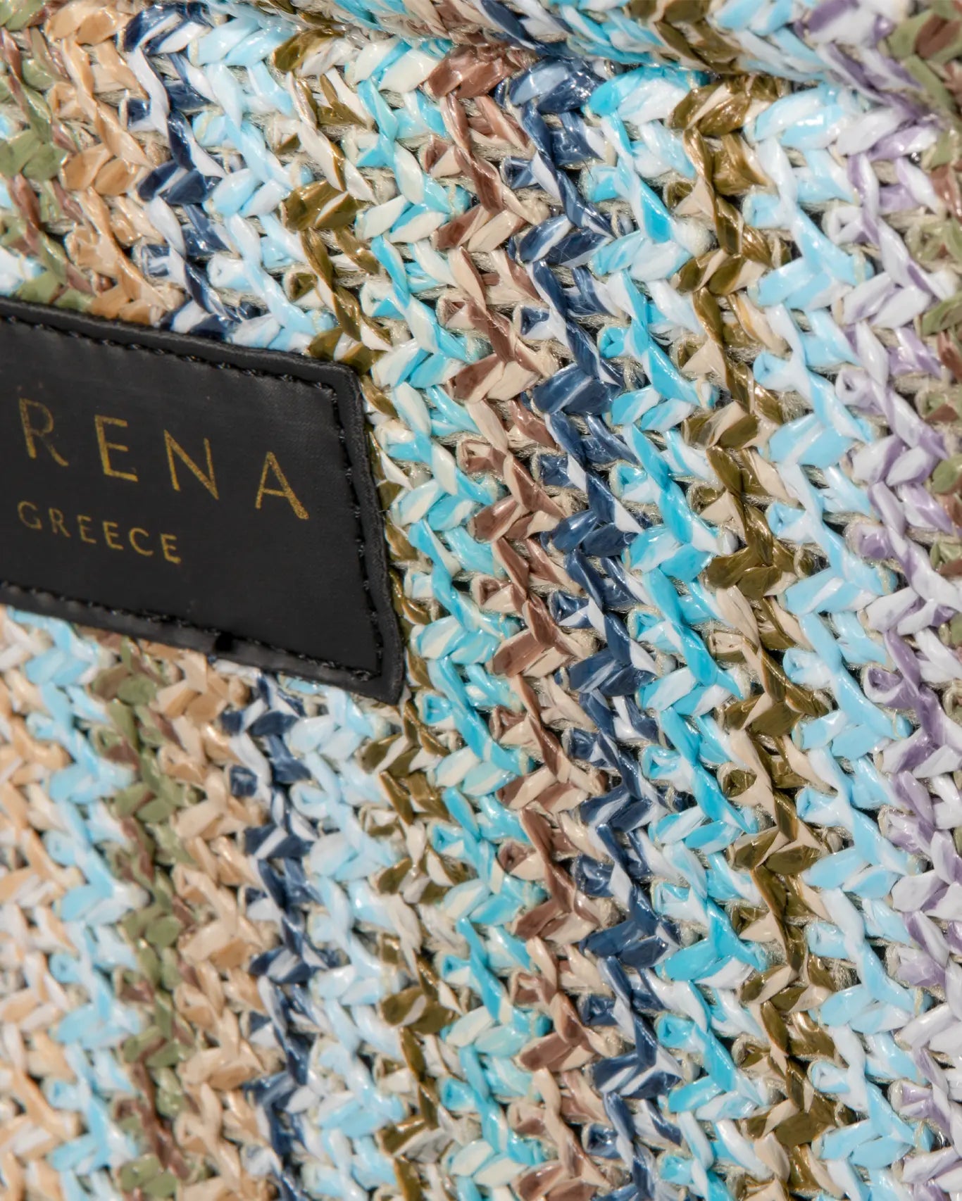 Nahaufnahme Elafonisos Medium Tote Sorena Greece, Naturstrohtextur Häkelflechtung Seegrün Sandbeige Lavendel Detailansicht.