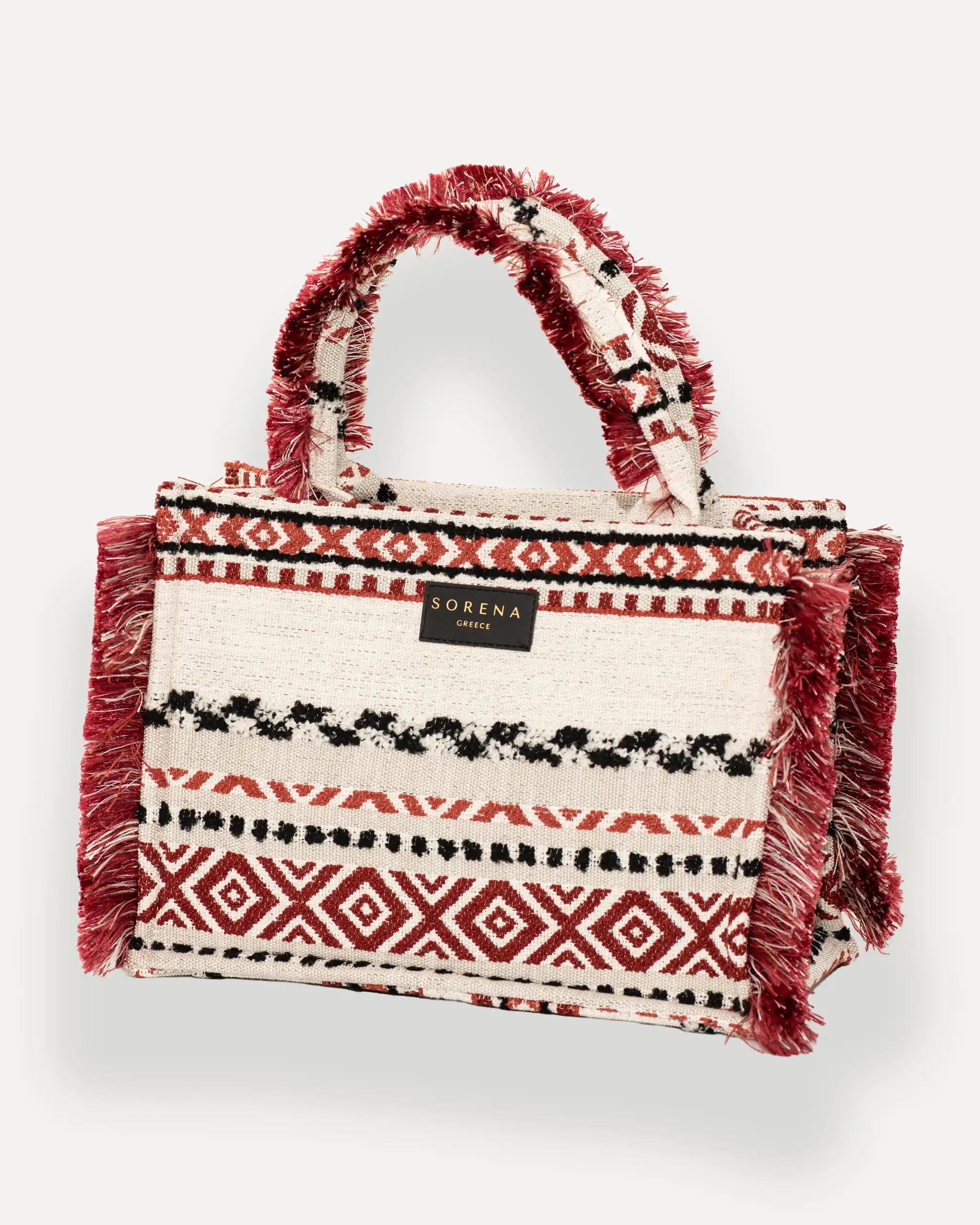 Sorena Greece Large Tote Bag linksseitig getragen – strukturierte shopper tasche mit Fransen und abnehmbarem Schulterriemen, ideale boho tasche für dinner und city looks, bags schweiz mit Designfokus.