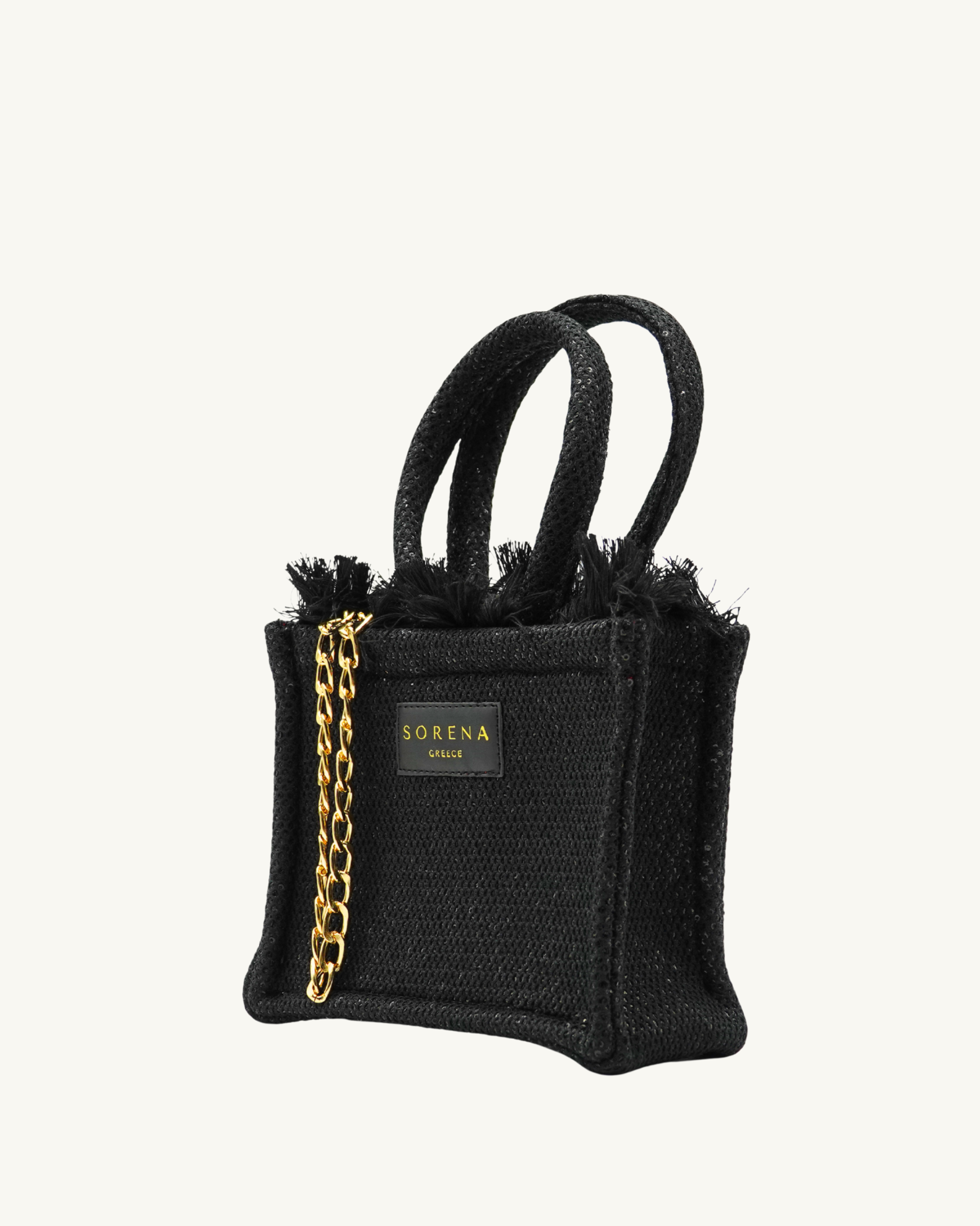 Linke Seitenansicht der handgemachten SORENA Mini-Tasche ADORA in Schwarz-Gold mit Pailletten – stilvoll und nachhaltig aus dem SIMORA-Shop