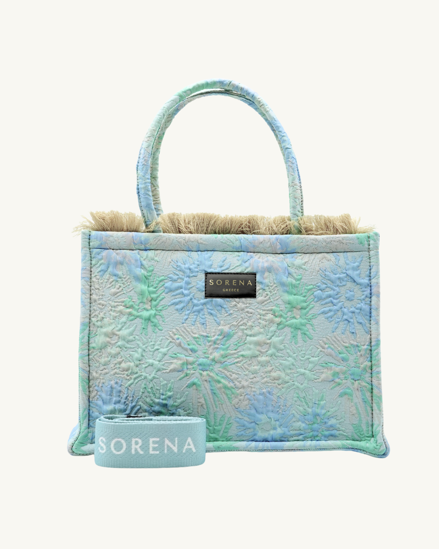 Frontansicht der SORENA CORAL Shopper – handgemacht aus veganem Material mit strukturierter Oberfläche und mediterranem Muster in Blau-Grün, nachhaltig produziert für stilbewusste Frauen.