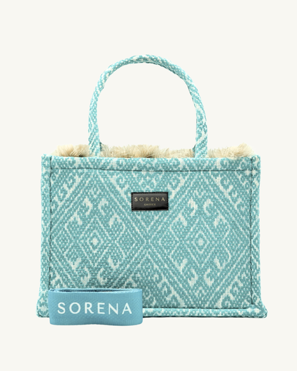 Frontansicht der SORENA SXOINOUSA Shopper – handgemacht aus veganem Material mit strukturierter Webtextur in Türkis, nachhaltig produziert für Frauen mit Stil und Insel-Flair.
