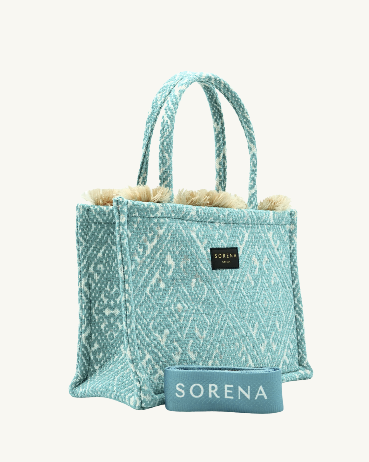 Seitenansicht der handgemachten SORENA SXOINOUSA Shopper – vegane, nachhaltige Tasche mit traditionellem Webmuster in Türkis und klarer Linienführung.