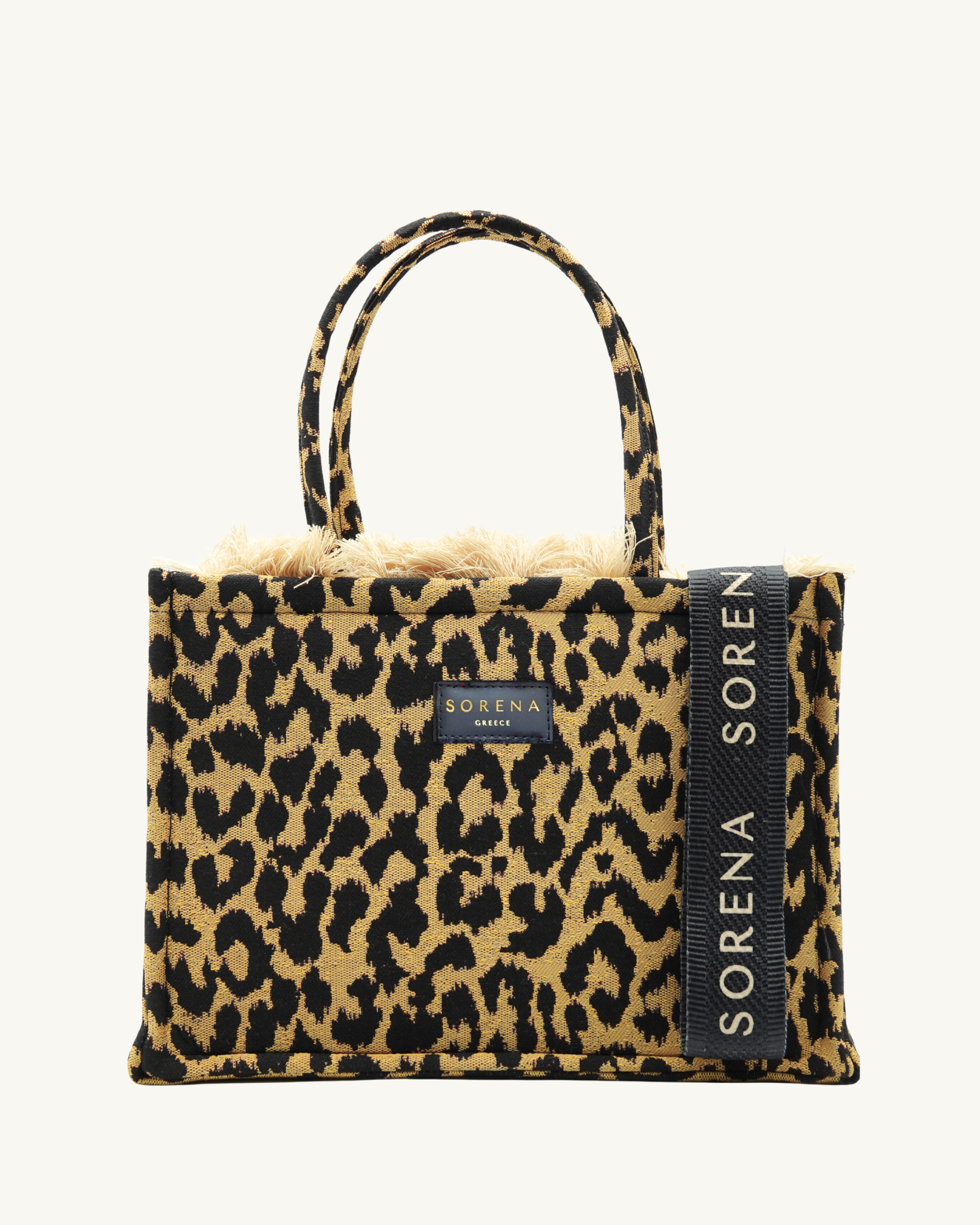 WILD Shopper frontal mit hängendem SORENA-Riemen – Leopardenmuster, Fellbesatz & Markenlabel, handgemacht & vegan