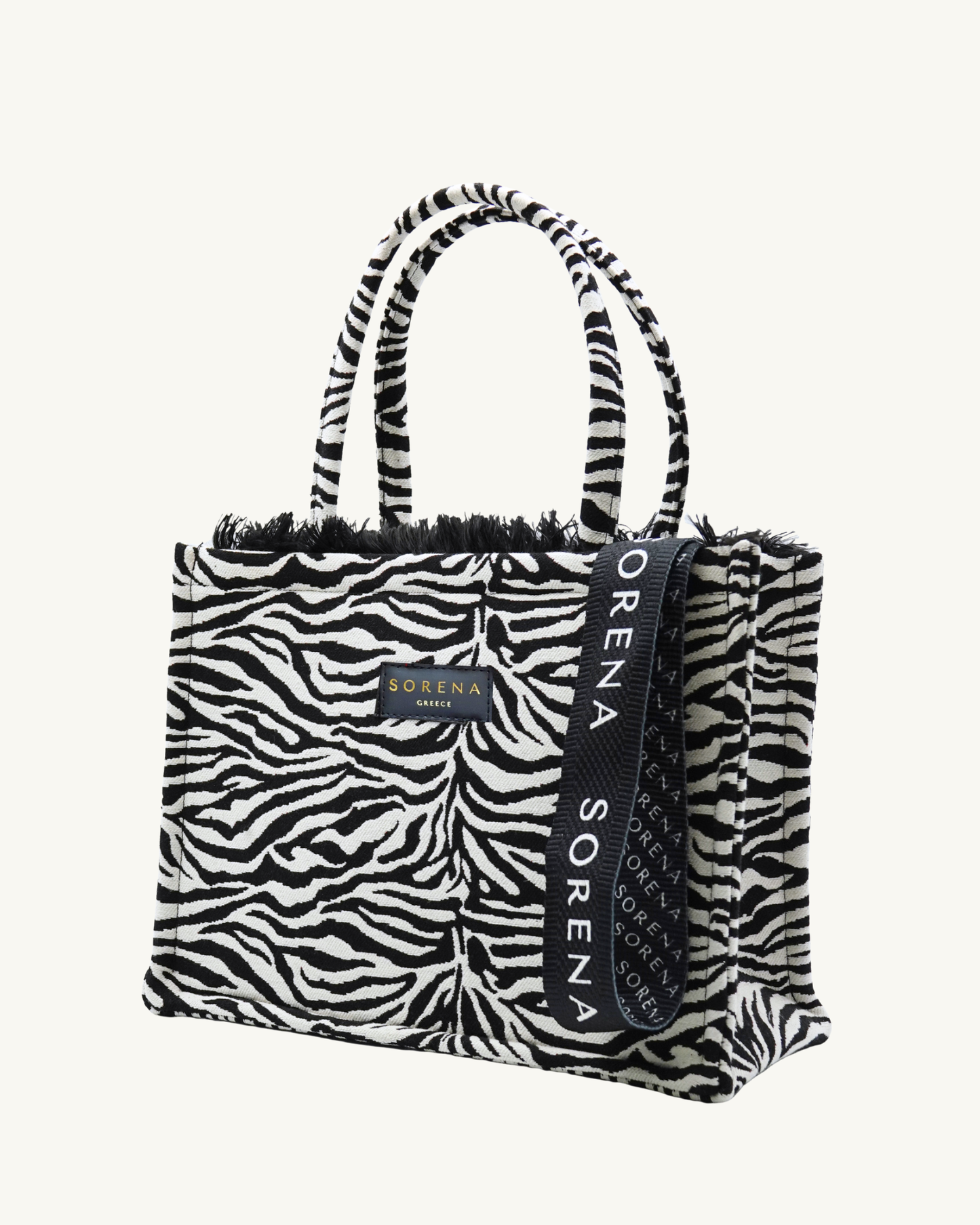 ZEGNIA Shopper seitlich – Zebra-Struktur mit Tiefe, Fransenbesatz & Markenlabel, nachhaltig verarbeitet