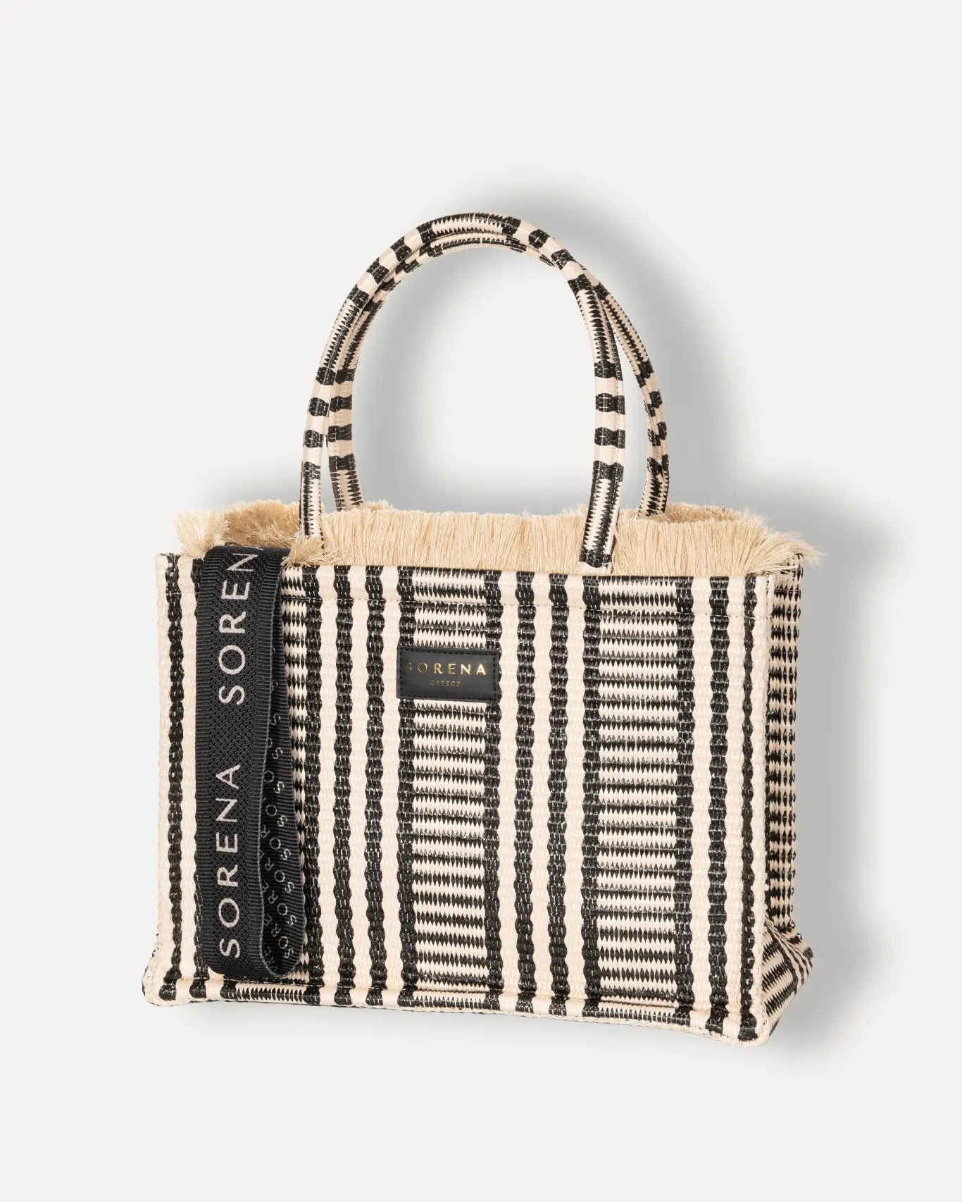 Linke Seite Ammos Medium Tote Bag Sorena Greece, naturtöniger Shopper Sandfarben griechischer Sommer breite Griffe handgefertigt.