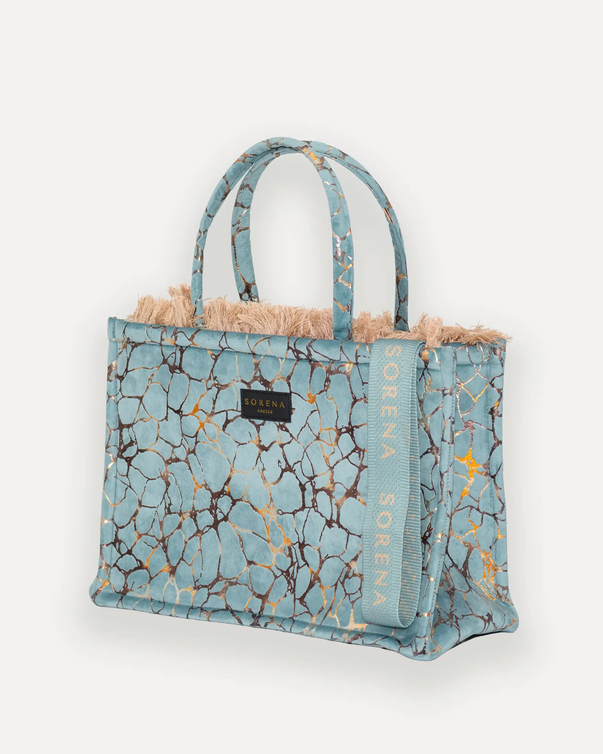 Linke Seitenansicht der grossen SORENA shopper bag – vegane tasche mit Struktur, handgefertigt in Europa, exklusiv bei SIMORA. Perfekt für stilbewusste Frauen in der Schweiz.