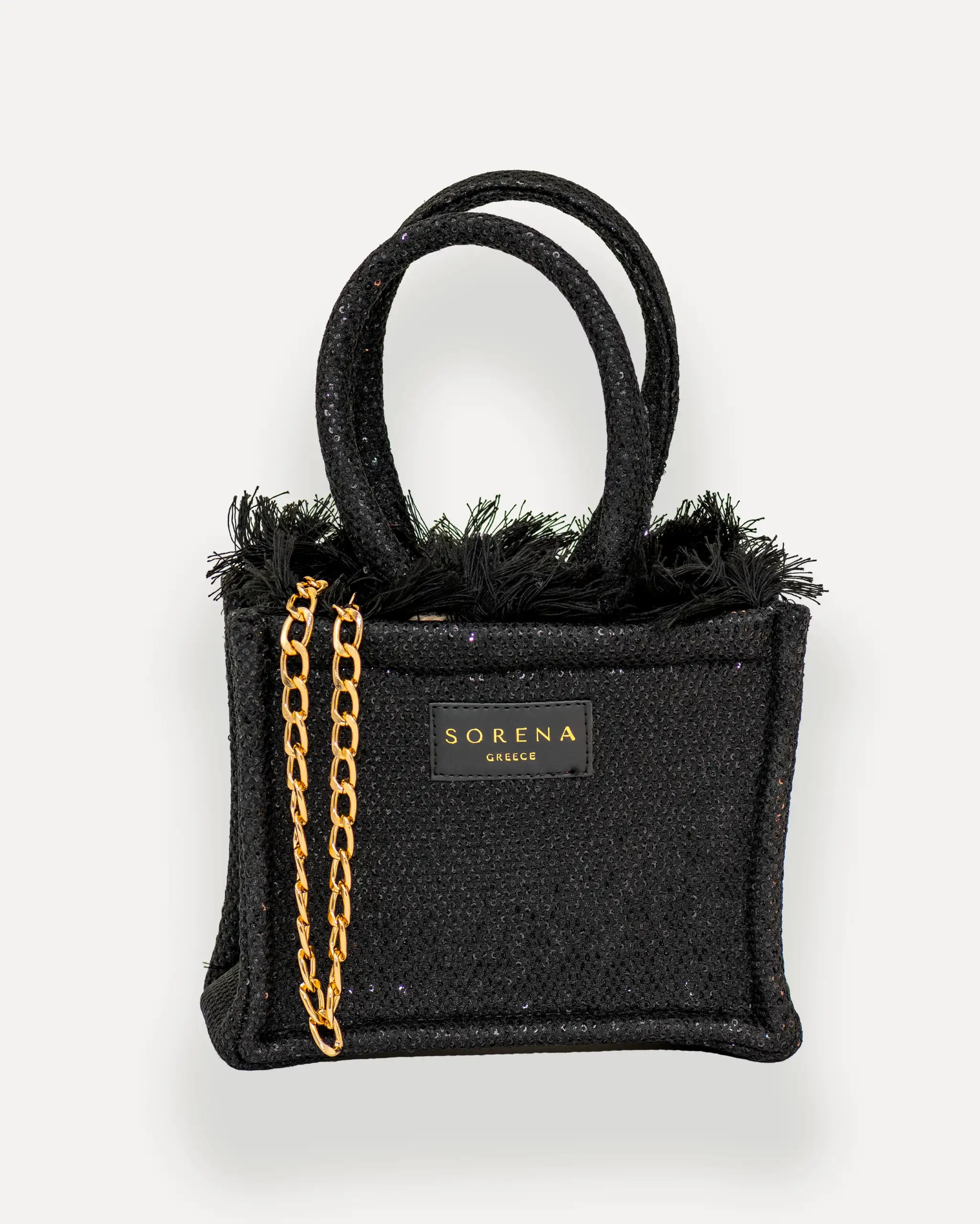 Frontansicht der Sorena Greece Mini Tote Bag – schwarze Glitzer-Oberfläche, Fransen, goldene Details und Label sichtbar, ideale mini tasche mit goldener umhängekette kaufen.